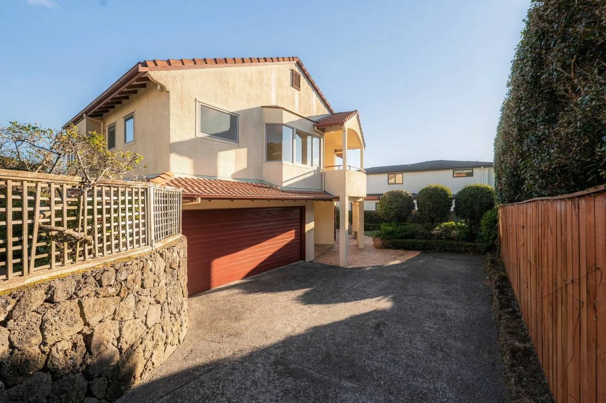 Garaging and stone wall
