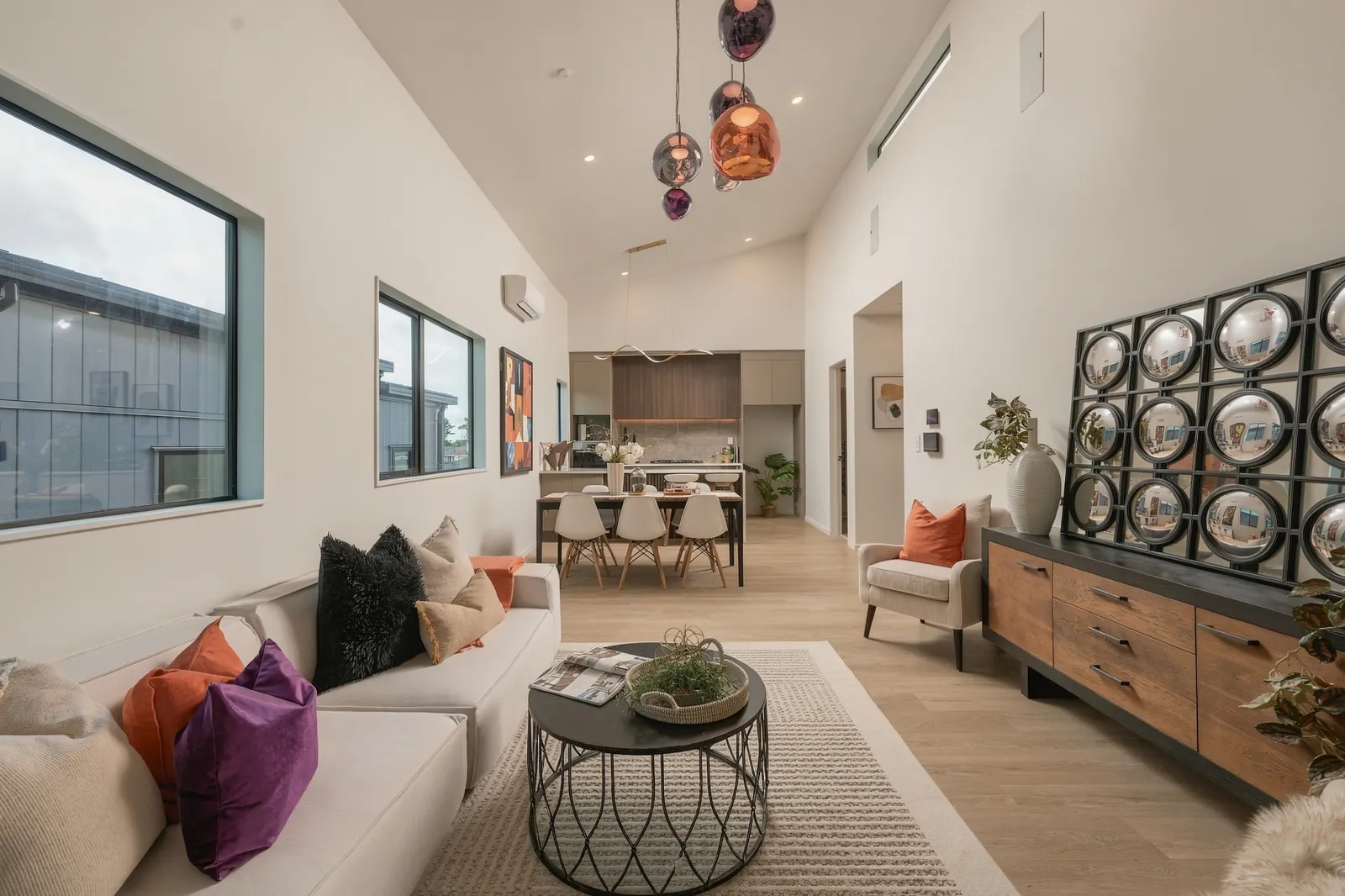 The same Auckland living room finished in AURA — Warm. Soft. Lived in.