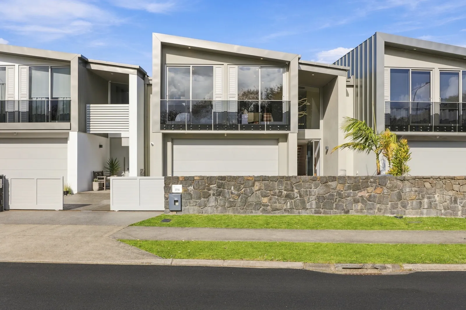 Street frontage, waterfront townhouse in Gulf Harbour, Hibiscus Coast