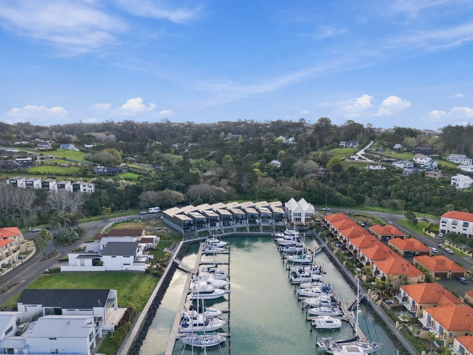 Aerial, the terrace and berths, waterfront townhouse in Gulf Harbour, Hibiscus Coast