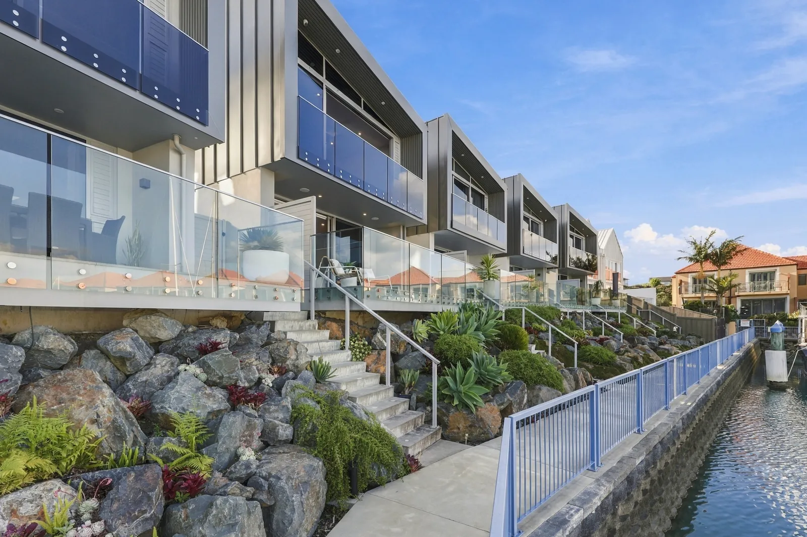 Rear elevation, waterfront townhouse in Gulf Harbour, Hibiscus Coast