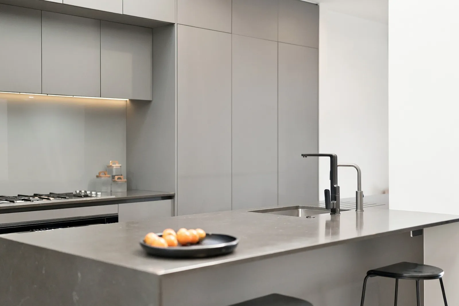 Kitchen, bench and tapware, waterfront townhouse in Gulf Harbour, Hibiscus Coast