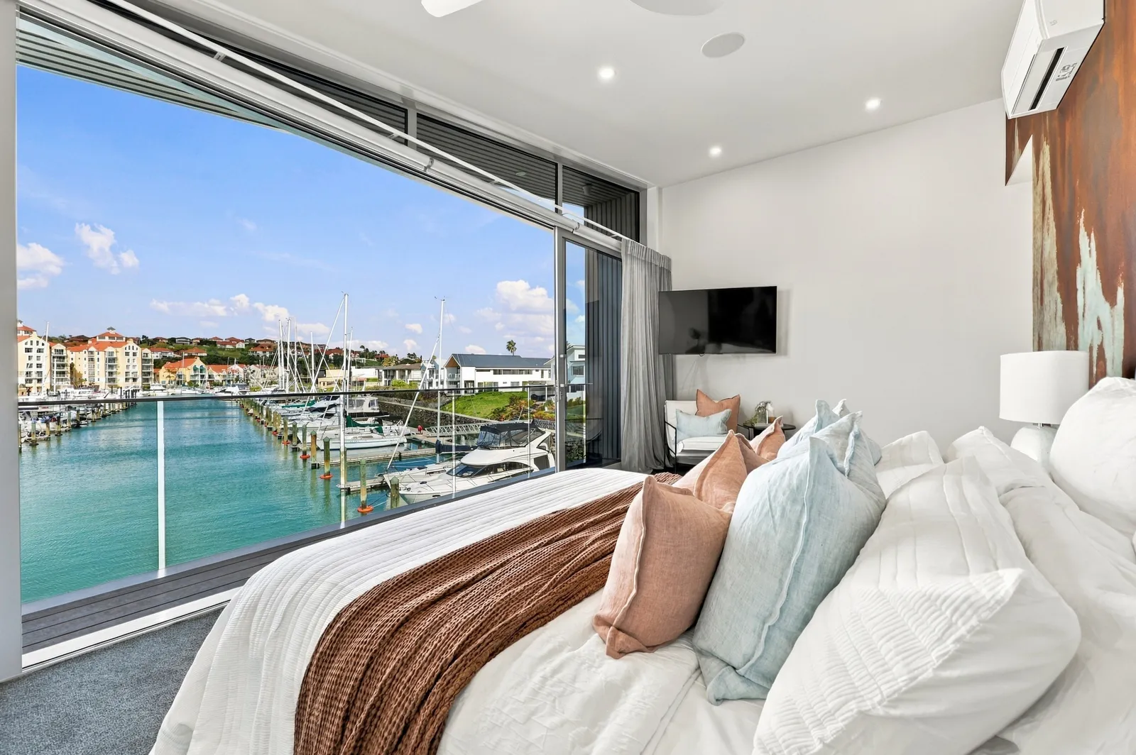 Main bedroom, waterfront townhouse in Gulf Harbour, Hibiscus Coast
